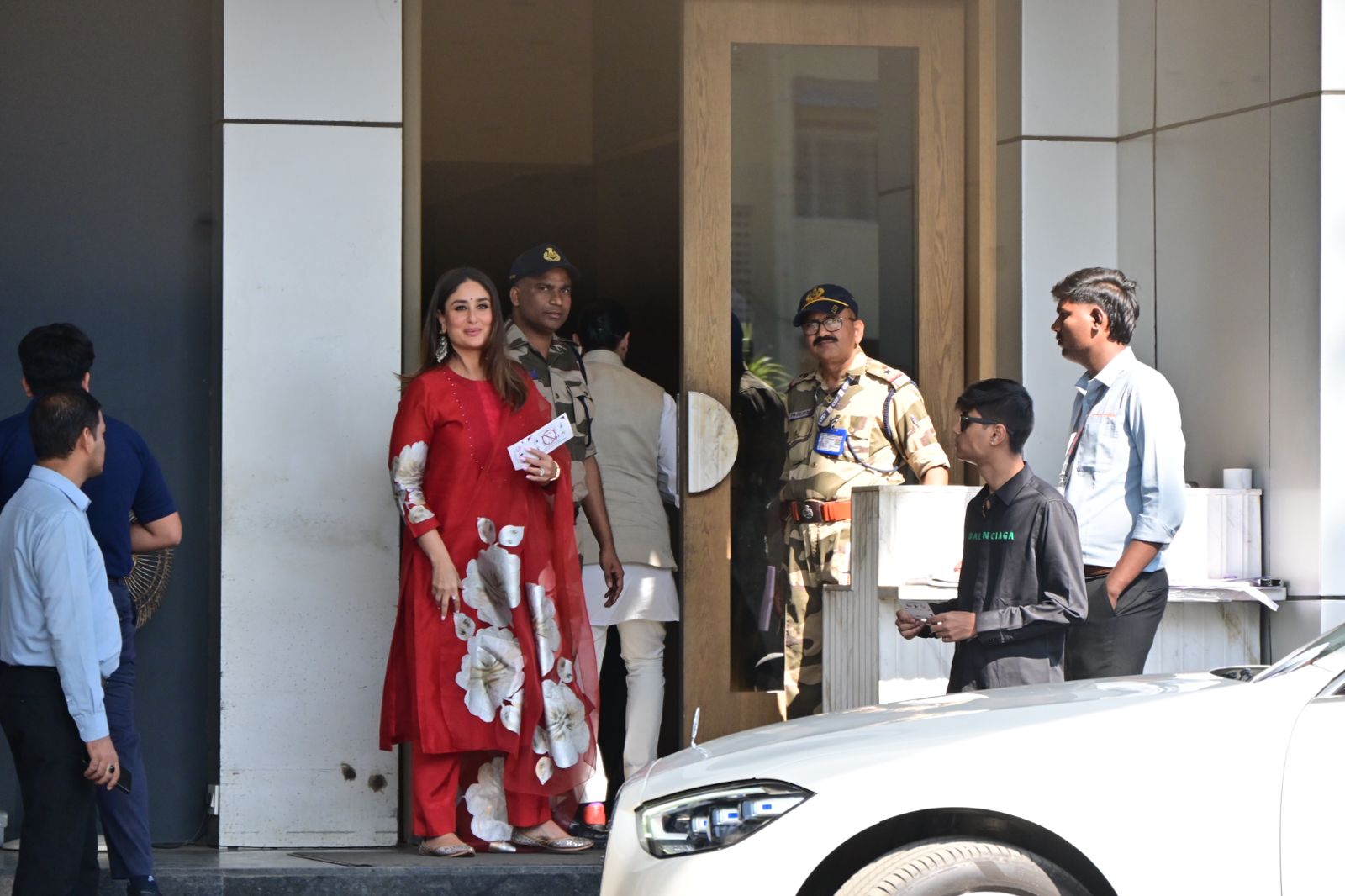 Kareena Kapoor was snapped at Kalina airport in a stunning red suit that features giant white flowers printed on it