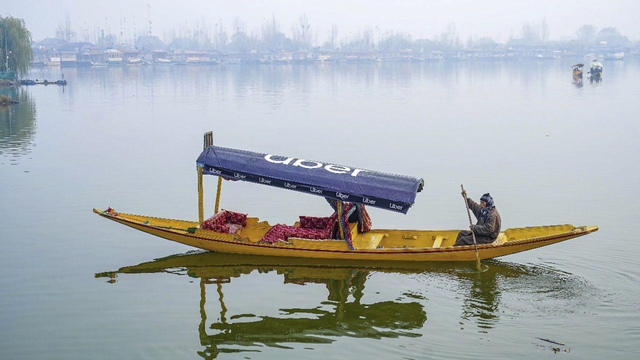 IN PHOTOS: Houseboats and shikaras sail silently as fog wraps Dal Lake