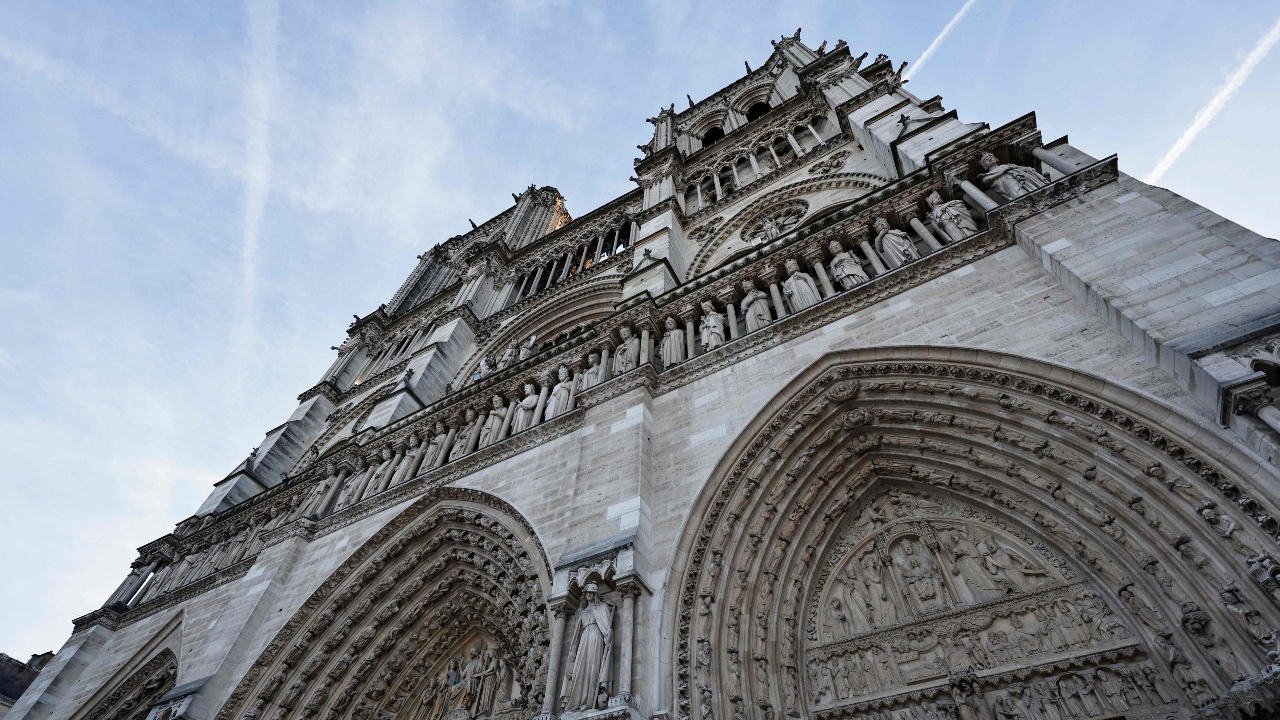 The occasion is French President Emmanuel Macron's final visit to the construction site to see the restored interiors for himself before the iconic monument's reopening for worship on December 8