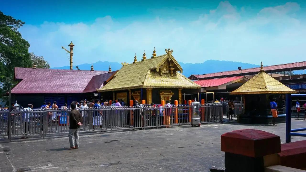 Pilgrims visit Sabarimala temple on opening day of long festive season