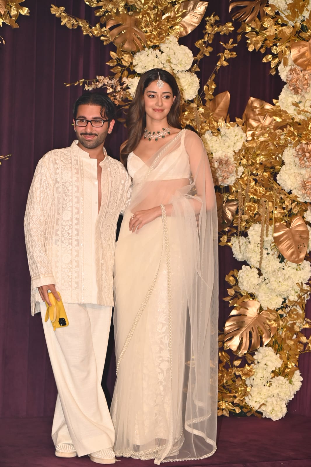 Ananya Panday oozed oomph in a white saree, which she matched with Orry, who posed alongside her