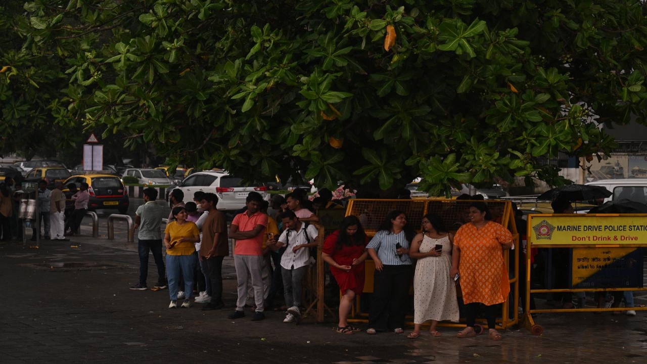 Many took cover under trees as rains made an unexpected comeback in the evening