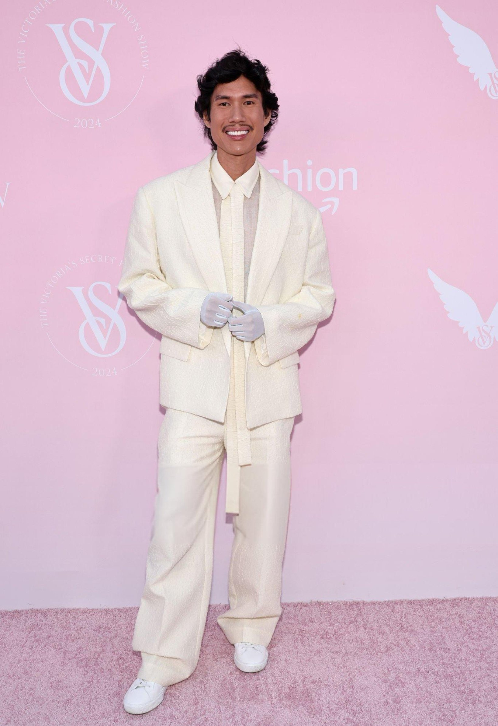 Patrick Ta made a statement on the Victoria's Secret Pink carpet in a sharp, all-white suit.